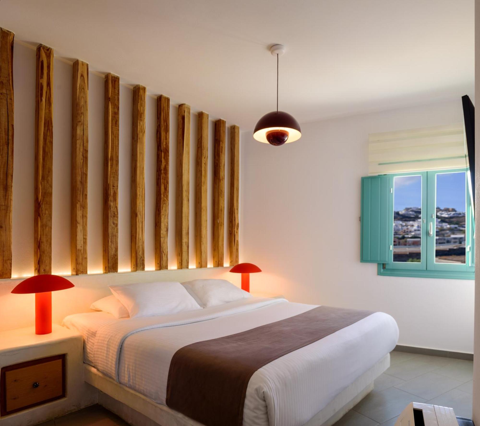 Neptune Luxury Suites Akrotírion Екстериор снимка